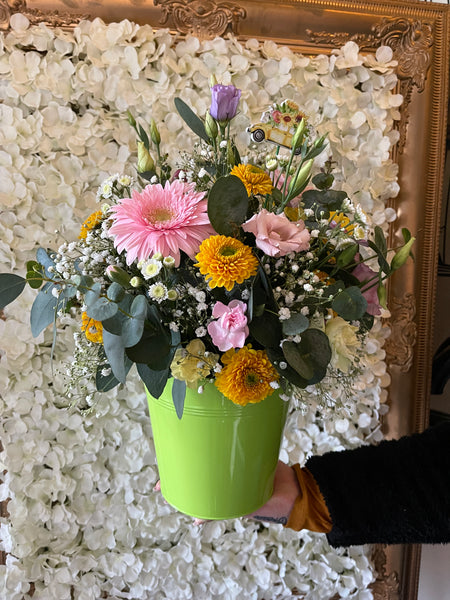 “Driving Miss Daisy” Zinc bucket containing fresh flowers