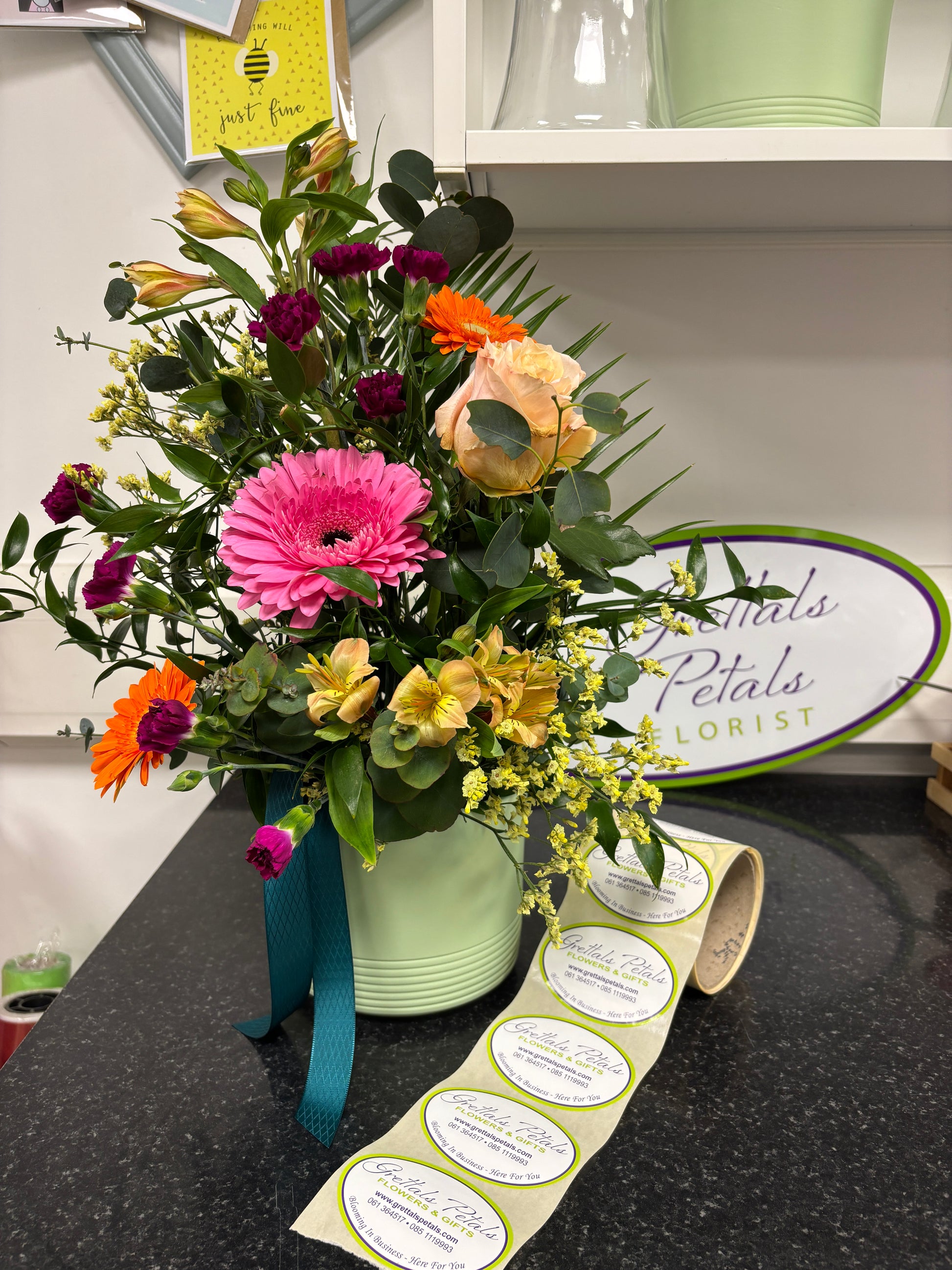 Sage Green Ceramic pot of fresh flowers