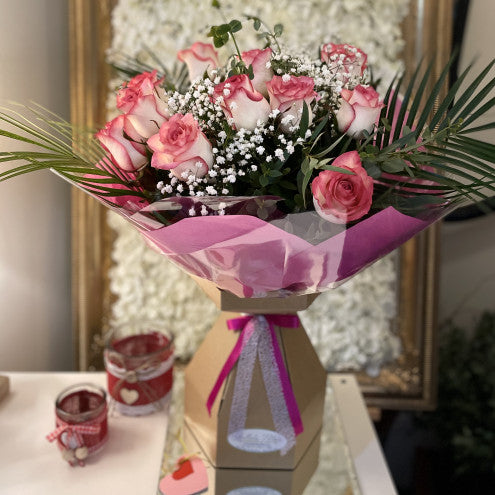 12 Jumilia Roses (available if ordered over the phone in advance)